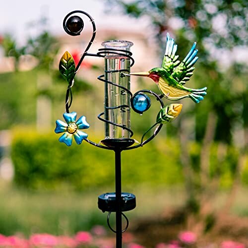 Colorful solar garden stake with hummingbird and flower design